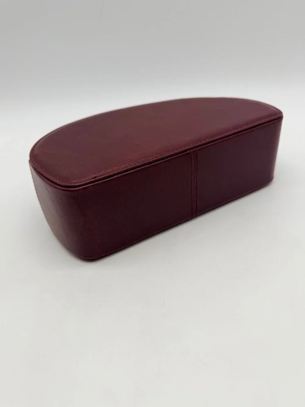 red Londo brand remote control holder features five compartments for organizatio